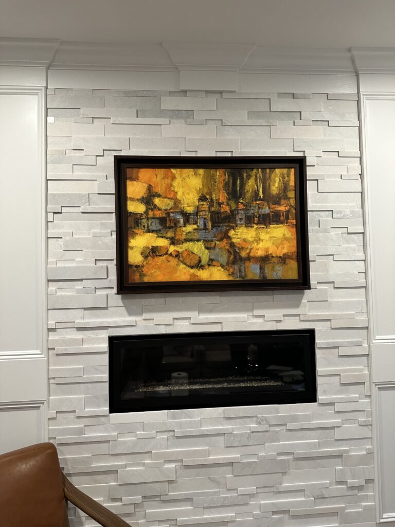 Fireplace and picture above